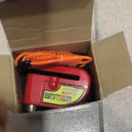 Candado Antirrobo Moto  con Alarma  – Recargable por USB, Acero Reforzado, Sensor de Vibración, Incluye Cable de Seguridad